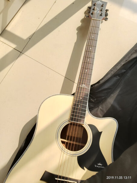 卡马D1CNM民谣吉他初学者木吉他入门吉它41英寸卡马D1C吉它出厂时配的是010还是011的弦？