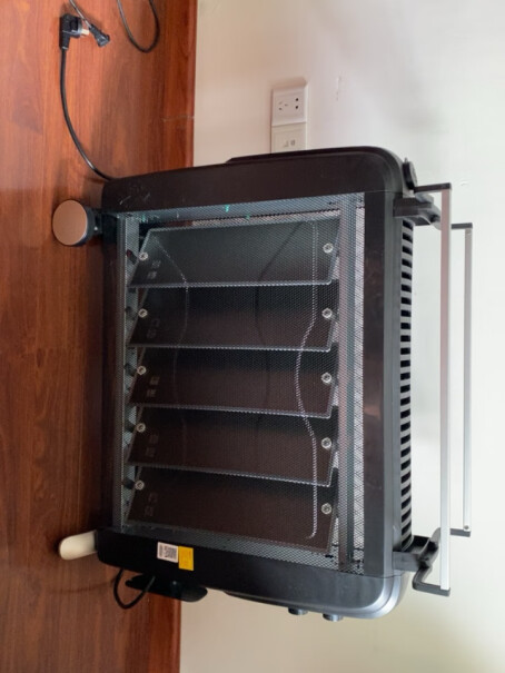 格力取暖器电暖气速热电热膜暖风机省电烤NDYC25C这是整个板面都是发热的吗？