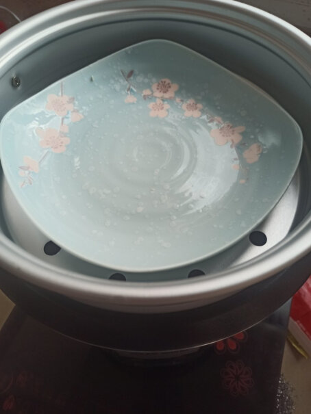 奥克斯电饭煲5L电饭锅直身式带蒸笼煮汤会溅水出来吗？