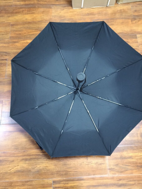 佳佰全自动雨伞三折伞折叠伞男士大号伞防风加固商务伞是黑胶的吗？