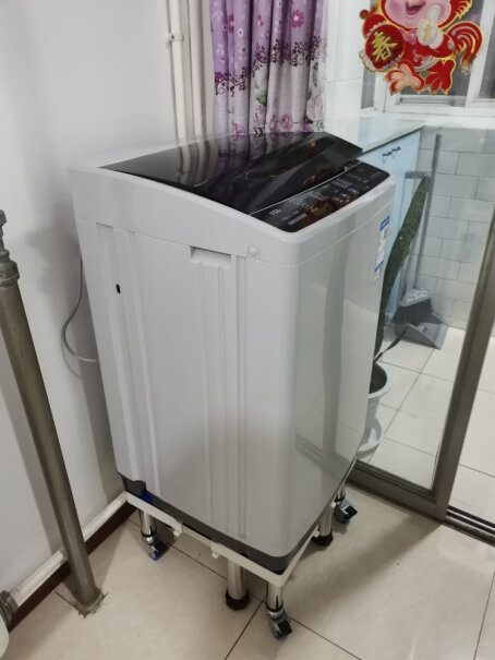 TCL10公斤大容量全自动波轮洗衣机钢化玻璃阻尼盖板洗1.8米被罩能洗 吗？