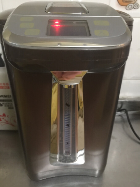 韩国现代电动打蛋器QC-DD2627怎样倒掉水壶里剩下的水？