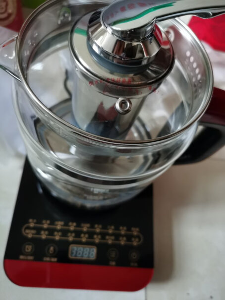 美的养生壶电水壶1.5L多功能烧水壶煮茶器我想问一下怎么水烧开后一直在烧水健上闪，都没有自动转保温键，是不是要自己调的？
