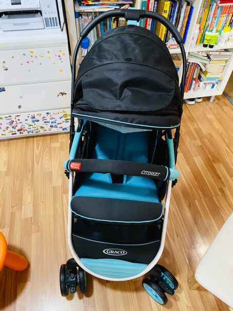 美国GRACO葛莱婴儿推车可座可平躺15kg以上能承重吗？ 靠背很软吗？宝宝坐上去背会弯？垫硬纸板垫到哪？