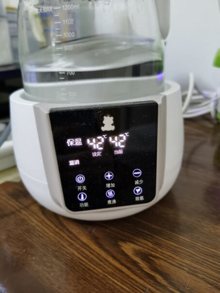 小白熊恒温调奶器1.2L美的皇冠和小白熊那个好？烧水有味道吗？