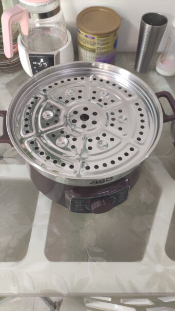 爱仕达电火锅5L大容量多段火力调节加厚合金锅体请问这个锅是分体式的还是连体的？