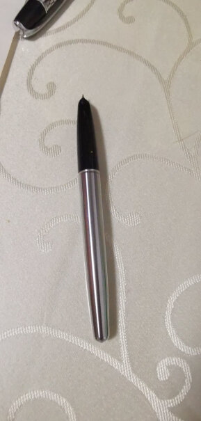 英雄钢笔100经典金尖钢笔商务办公墨水笔签字笔黑色银夹歪尖怎么办？不是特明显的那种？