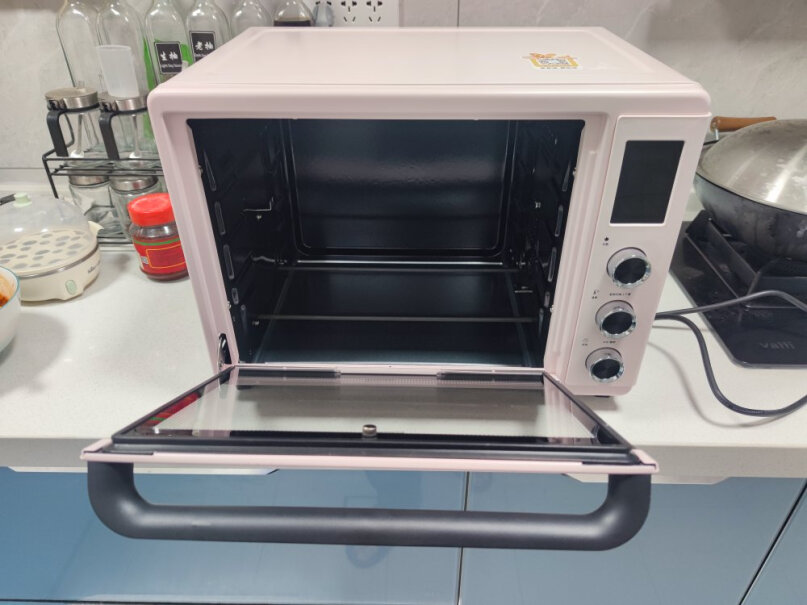 长帝家用多功能电烤箱42升大容量能放下14寸蛋糕胚吗？