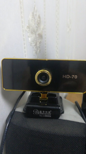 蓝色妖姬 HD-70高清摄像头如何关闭内设麦克风？