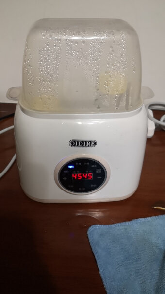 OIDIRE奶瓶消毒器烘干三合一温奶时，温度会升到行高吗，超过设定温度很多吗？