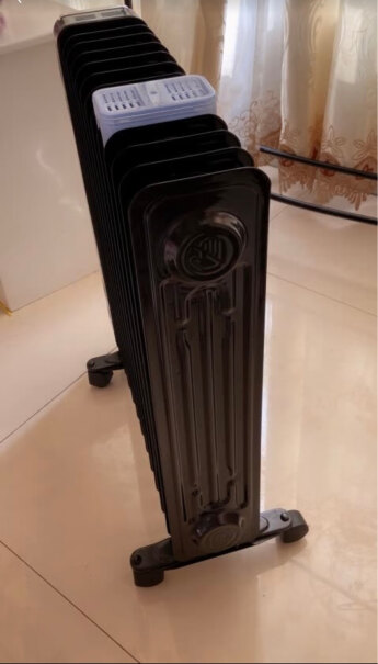 先锋Singfun取暖器电暖器电暖气片家用电热油汀13片全屋速暖低噪节能烘衣加湿DYT-Z2先锋与格力的哪个质量好？