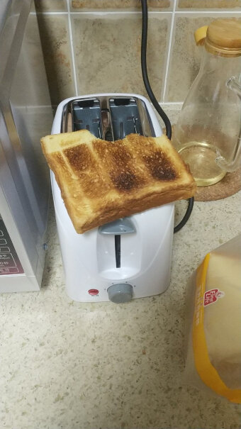 立客面包机家用烤面包机2片烤面包片机小面包多士炉早餐机有防尘盖吗？