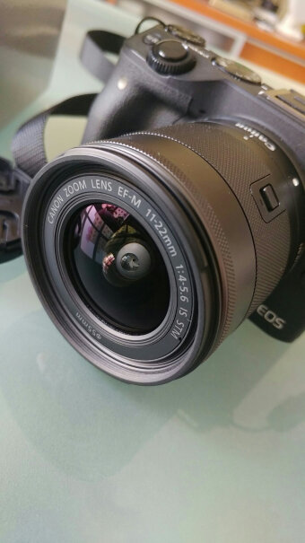 佳能EF-M 32mm定焦镜头这个镜头撇个广角作用，和15-45那个更适合当挂机头？可以代替15-45吗？