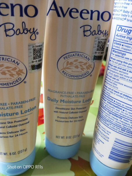 Aveeno艾惟诺婴儿保湿润肤身体乳各位买家买到的 瓶身侧面有贴纸吗？