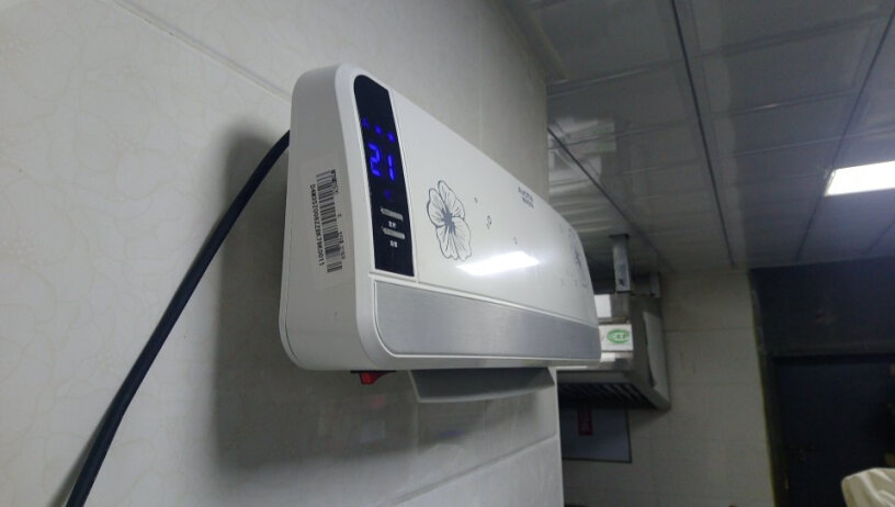 澳柯玛遥控居浴两用壁挂暖风机取暖器问一下这款温度都是多少的呢 能覆盖多少的范围呢，防水效果怎么样？热风热的快吗？