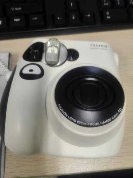 富士INSTAX MINI7s相机能把手机的照片导进去打印出来吗？