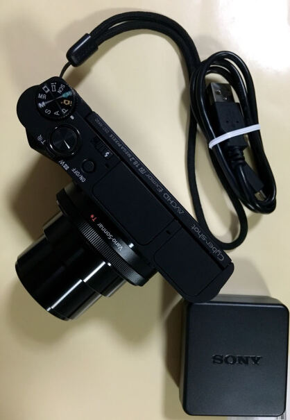 索尼DSC-HX60数码相机数码相机怎么拉近或推远镜头？