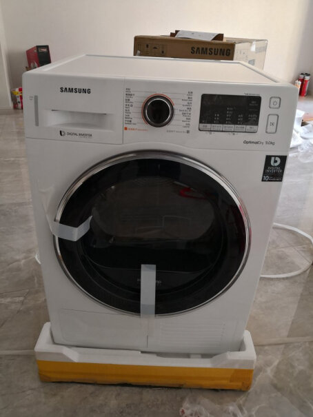 三星9公斤热泵烘干机家用干衣机低温护衣烘完的衣服是暖暖的还是潮潮的？能直接穿吗？