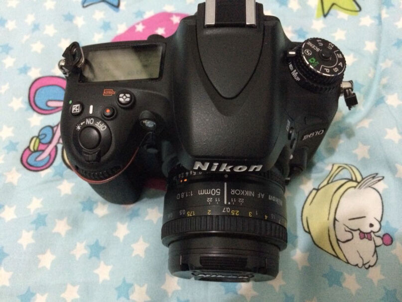 尼康AF-S DX标准定焦镜头我用的D5300镜头是18_55的，想换个拍人像的，用35还是50呢？