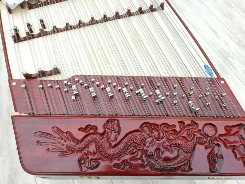 星海扬琴乐器平雕腾龙演奏402杨琴原木色非洲紫檀材质扬琴有无联系电话？