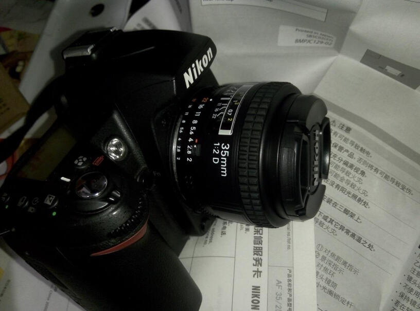尼康 AF 35mm f/2D 广角镜头这款镜头用在D90相机上可以自动对焦吗？