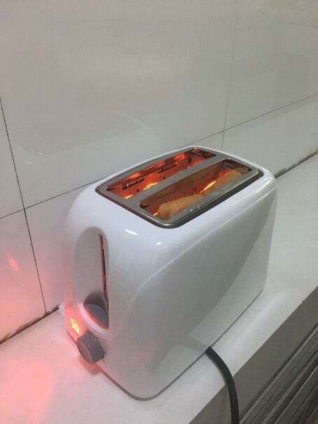 立客面包机家用烤面包机2片烤面包片机小面包多士炉早餐机请问这个能不能用住？