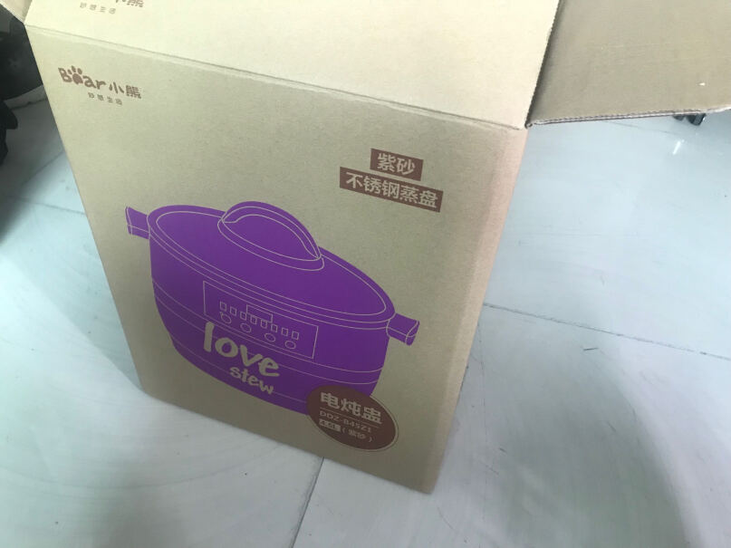 小熊电炖锅紫砂锅隔水炖盅家用白瓷大容量煲汤煮粥燕窝放水蒸的内胆是紫砂还是塑料的？